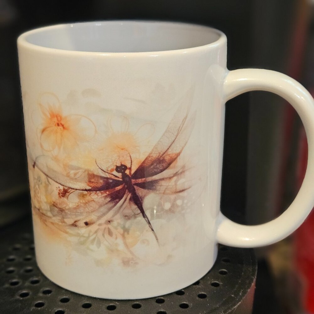 12 Oz. Coffee mug with a watercolor dragonfly design.